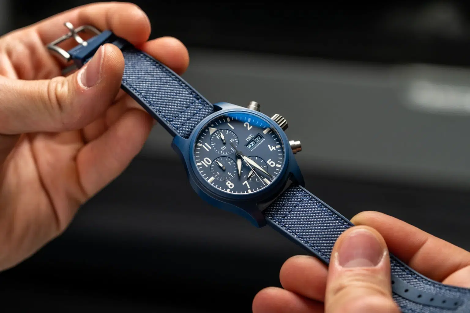 Close-up of IWC Pilot's Watch Chronograph 41 Top Gun Oceana showcasing its blue dial, chronograph subdials, and textured blue strap