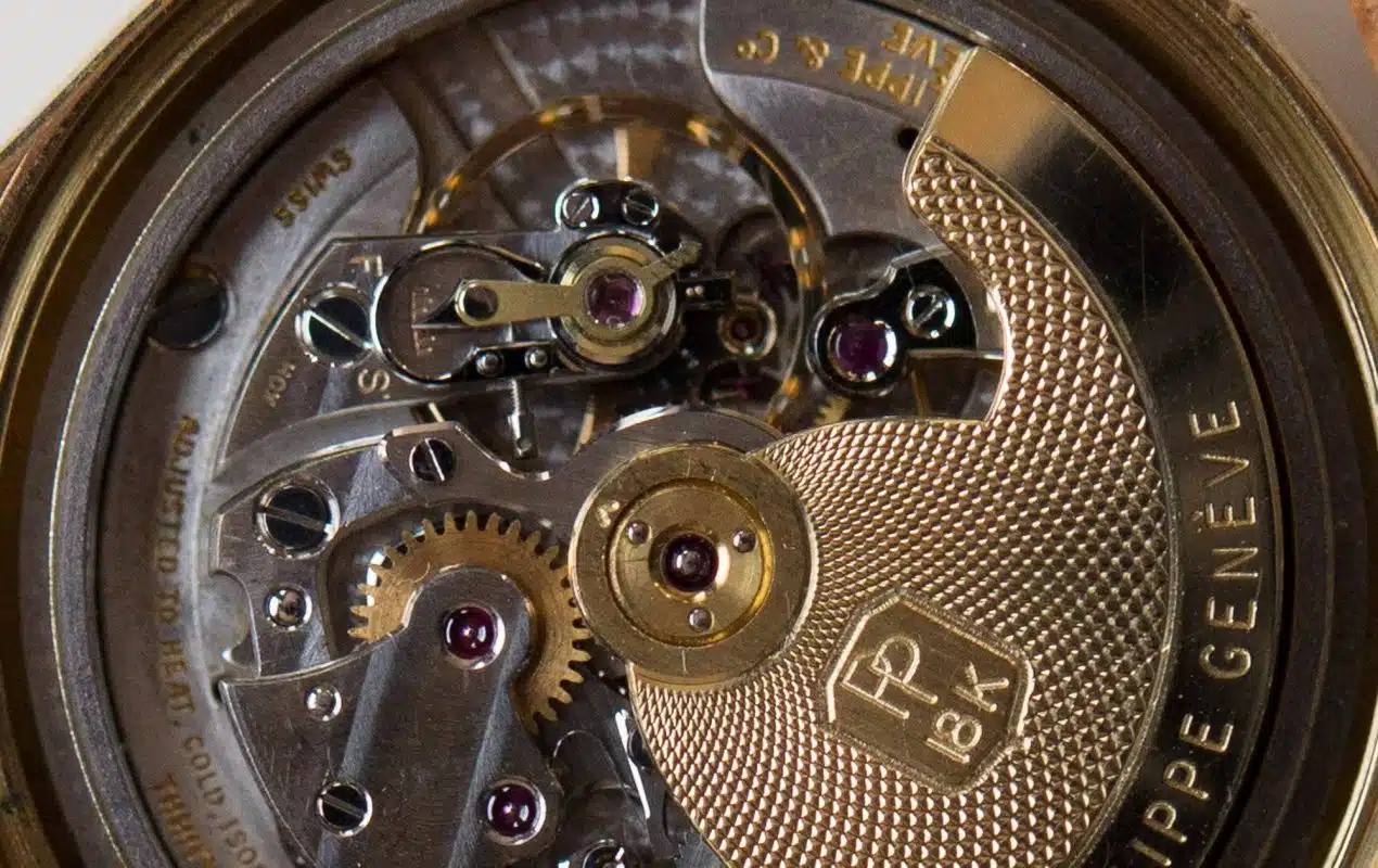 Close-up of Patek Philippe automatic watch movement with 18k gold rotor